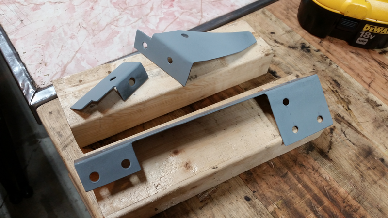 Not a fan of actually welding through this, but it’s good to put on the backs of stuff about to be sandwiched for all eternity. Yes, the top-most piece is meant to have that curve to the big part.